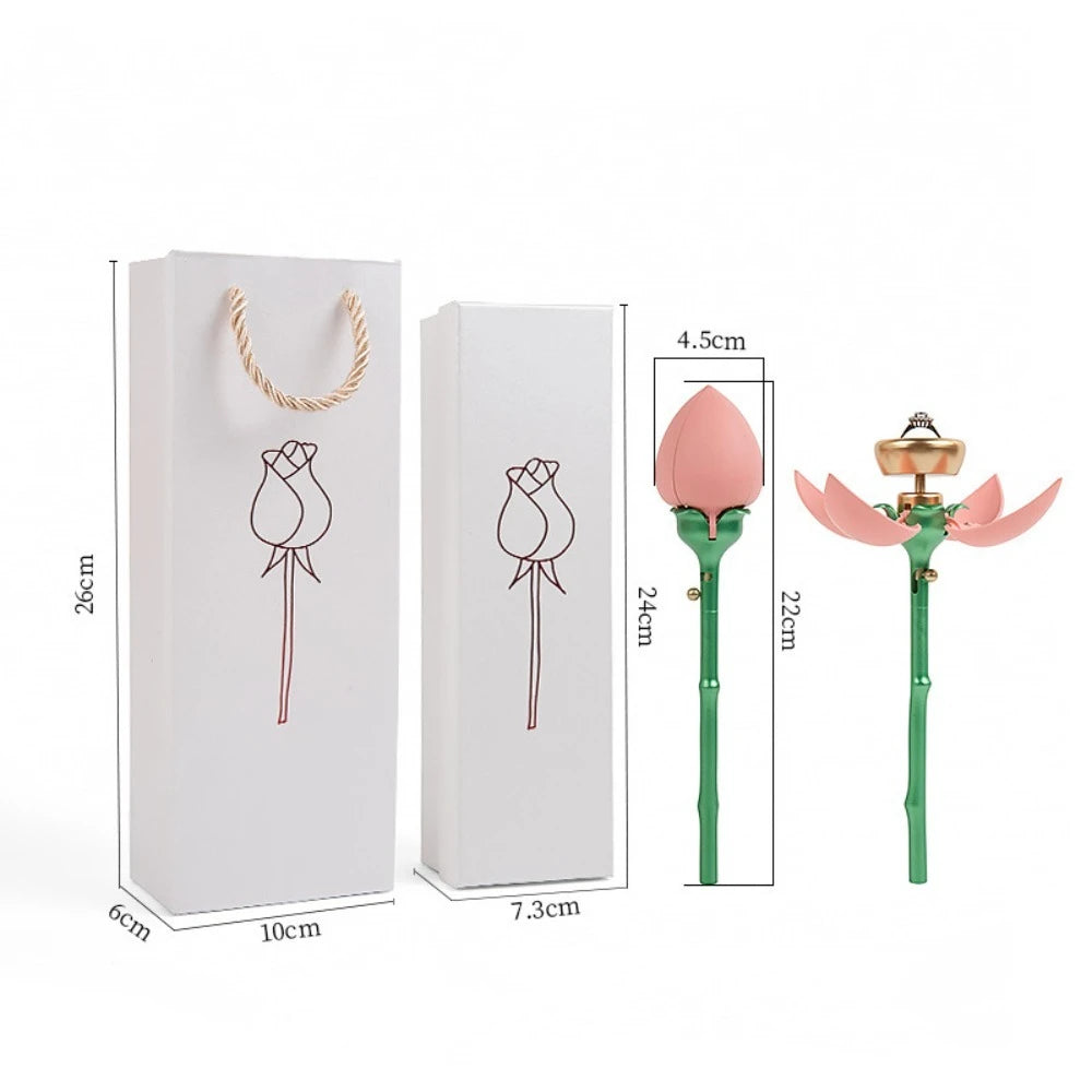 Pink and red rose flower jewelry boxes displayed on table | ARLOW