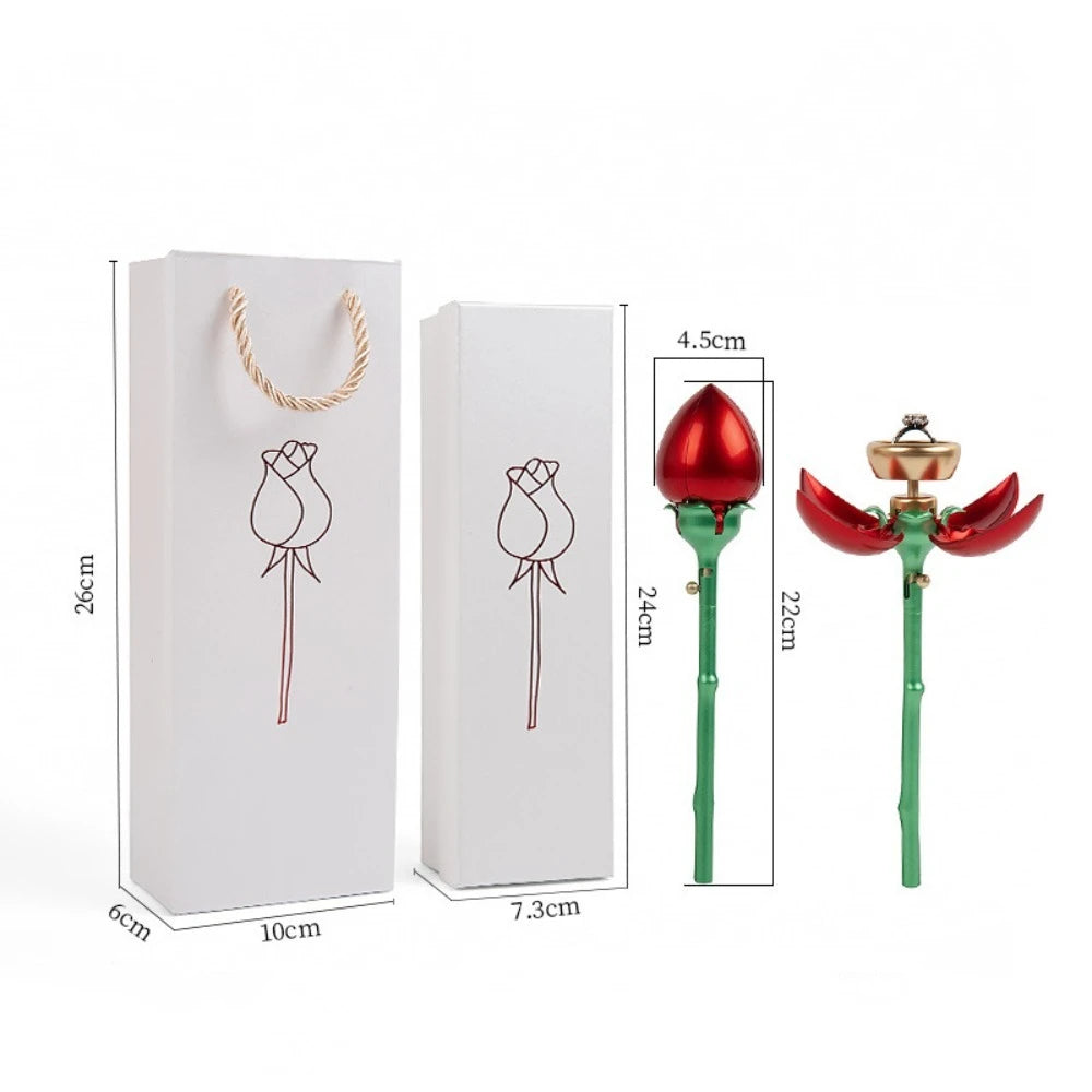 Pink and red rose flower jewelry boxes displayed on table | ARLOW