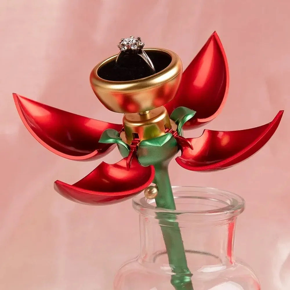 Pink and red rose flower jewelry boxes displayed on table | ARLOW