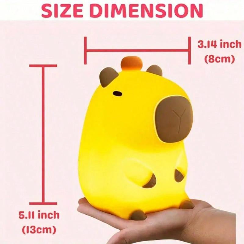 Soft-touch silicone capybara lamp in warm yellow glow | ARLOW