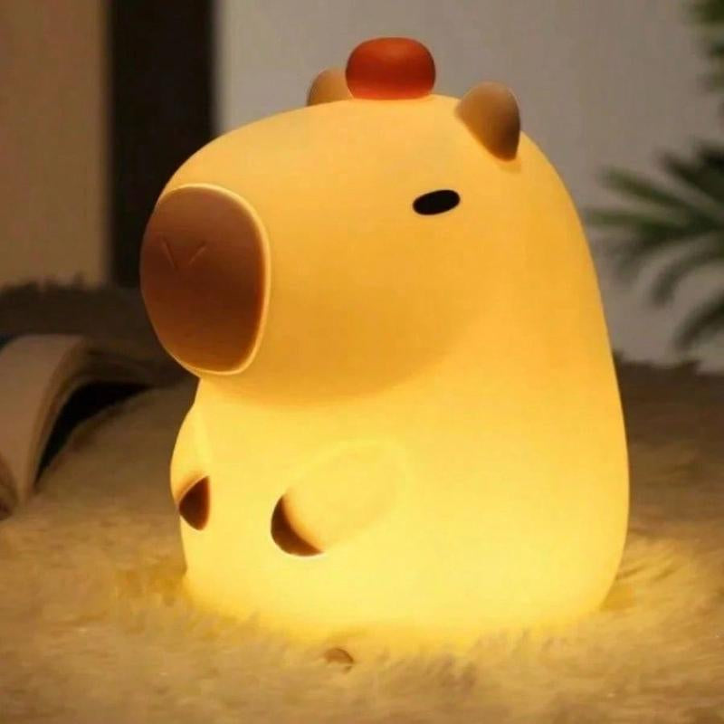 Capybara silicone night light glowing softly on bedside table | ARLOW