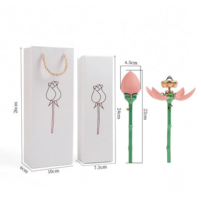 Pink and red rose flower jewelry boxes displayed on table | ARLOW