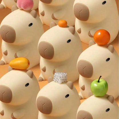 Soft-touch silicone capybara lamp in warm yellow glow | ARLOW